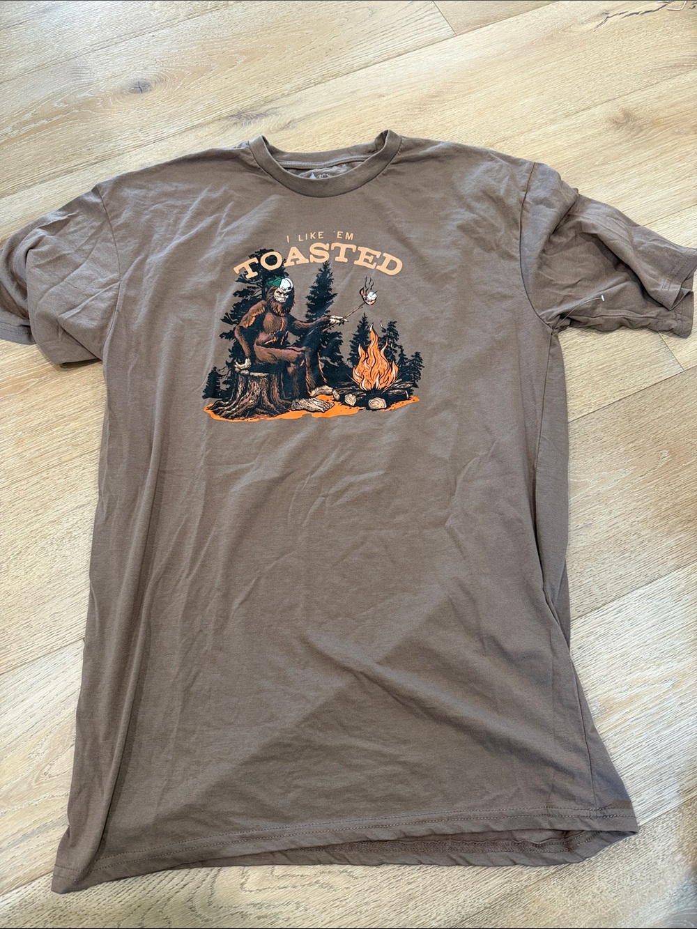 Brown Short-Sleeve Graphic Tee with Campfire Design